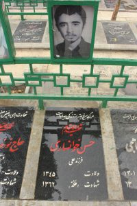 عکس مزار شهید حسن خوانساری رزوه فرزند علی